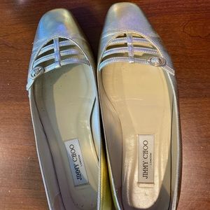 Gold Ballet flats by Jimmy Choo